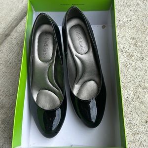 Size 6.5 black patent pumps